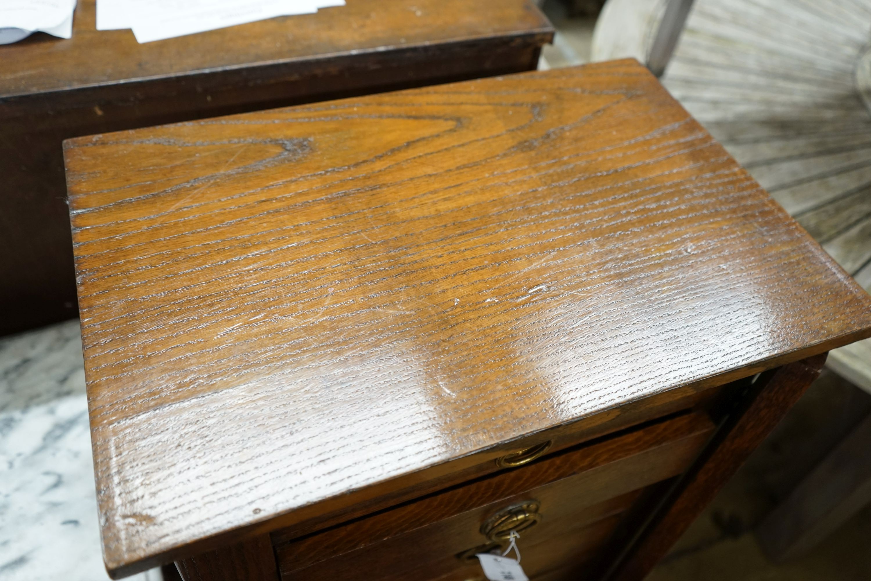 A 1920's oak Wellington chest, width 51cm depth 34cm height 105cm